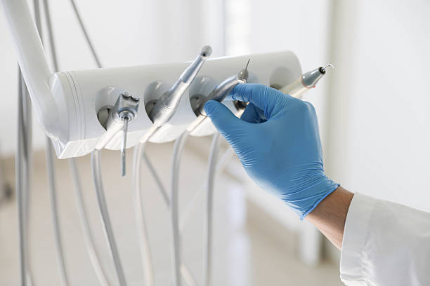 Professional Tooth Extraction technician working in Oak Trail Shores, TX